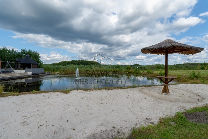Na sprzedaż 1,3 ha zagospodarowane nad jeziorem, l