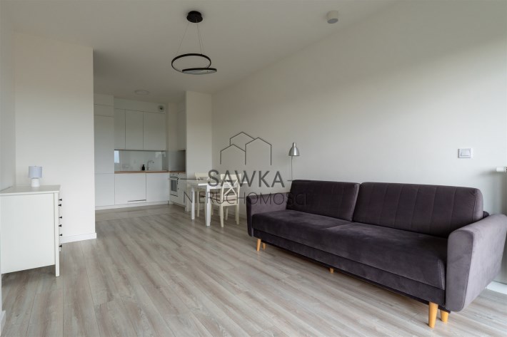 Salon z sofą i miejscem do wypoczynku